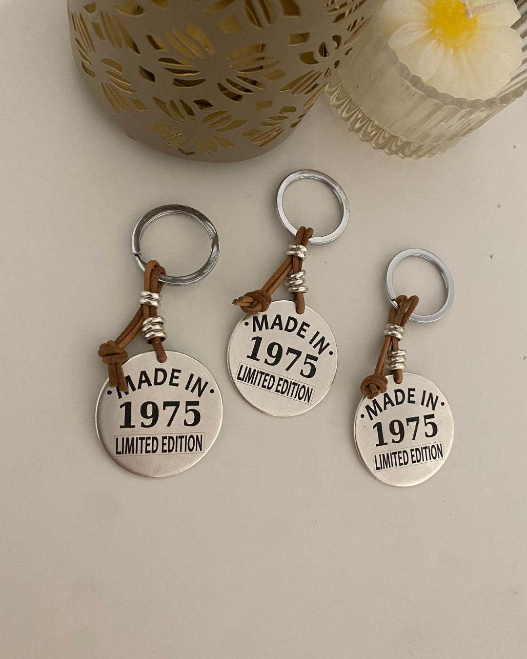 LLAVERO REDONDO BAÑO PLATA