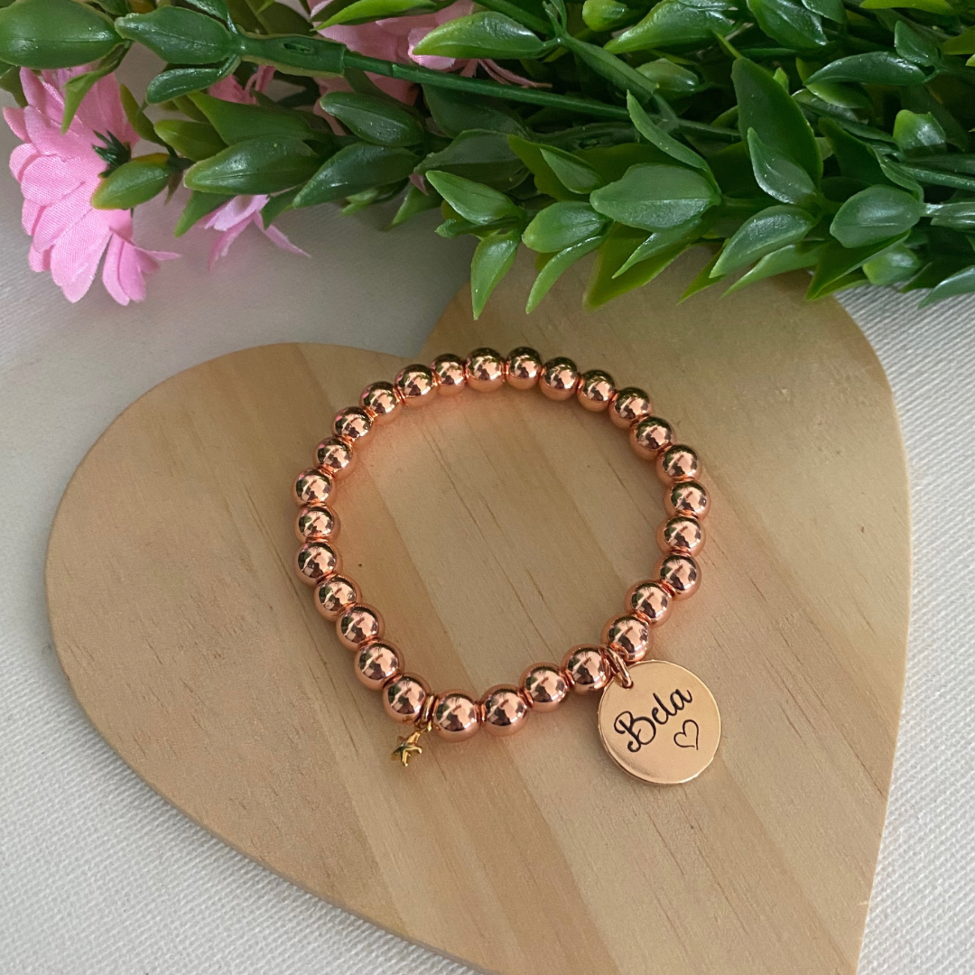 PULSERA BOLAS ORO ROSA