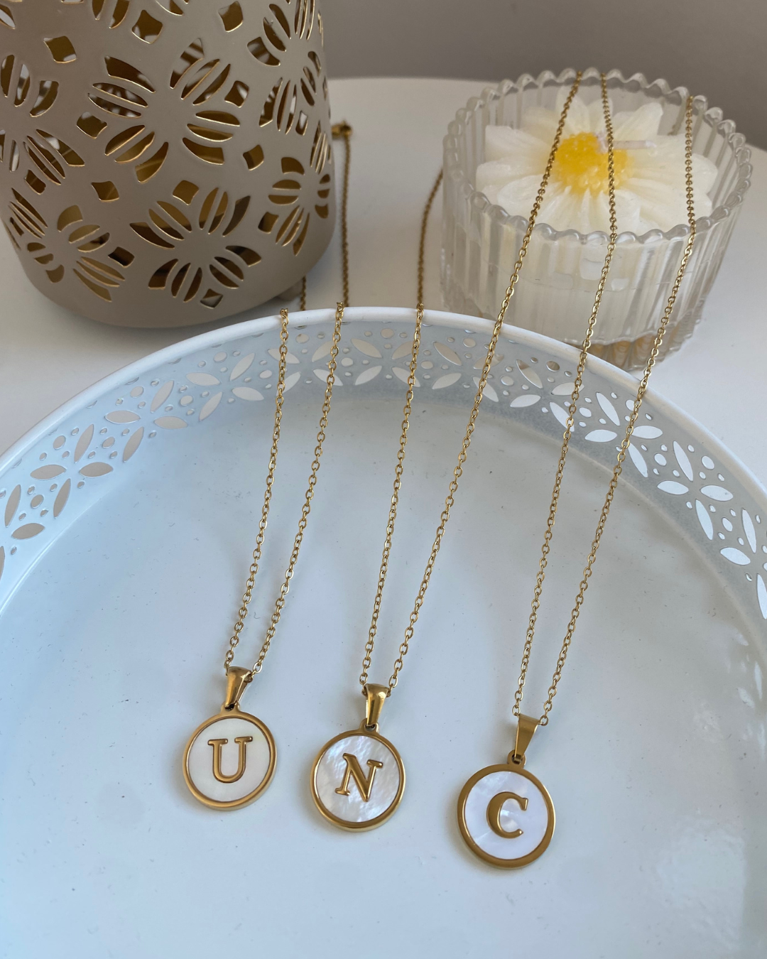 COLGANTE INICIAL CONCHA ACERO